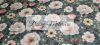 Flowers on a green background Elastic cotton jersey