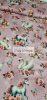Stretch cotton jersey with swans and unicorns